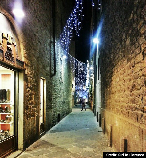 Small street in Florence lit up for Christmas